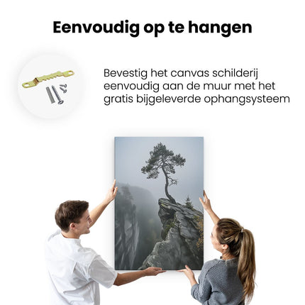 Canvas schilderij ophangen Eenzame Boom aan de Rand van een Klif