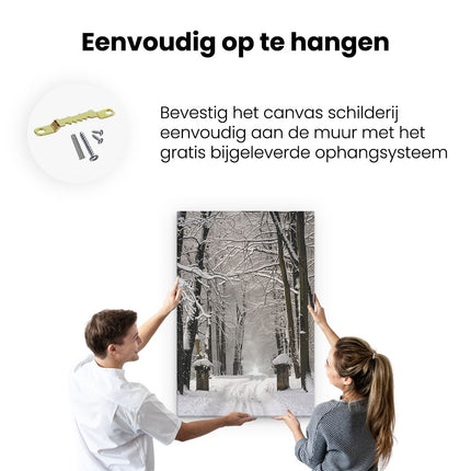 Canvas schilderij ophangen Besneeuwde Pad door een Bos