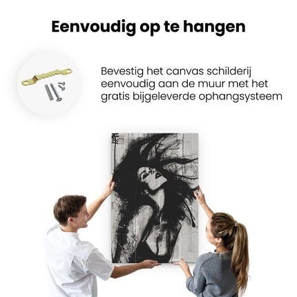 Canvas schilderij ophangen Zwart Wit Beeld van een Vrouw met haar Haren Wapperend in de Wind