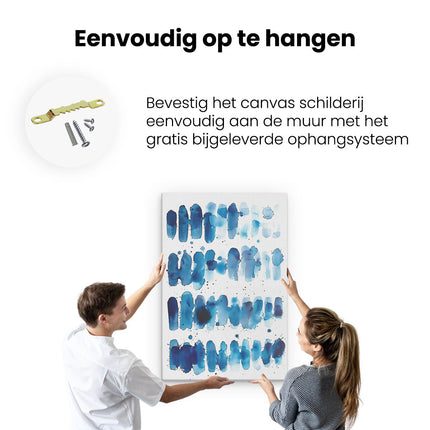 Canvas schilderij ophangen Blauwe Inktspatten op een Witte Achtergrond
