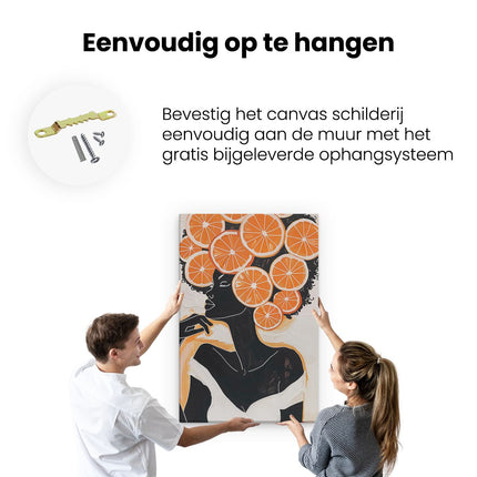 Canvas schilderij ophangen Vrouw met Stukjes Sinaasappel op haar Hoofd