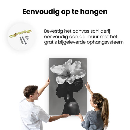 Canvas schilderij ophangen Zwart Wit Portret van een Vrouw met een Bloem op haar Hoofd