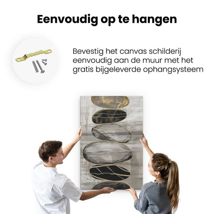 Canvas schilderij ophangen Stapel Zwarte en Gouden Stenen