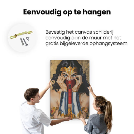 Canvas schilderij ophangen Wondervrouw die een Boek Vasthoudt