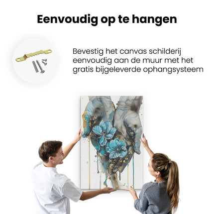 Canvas schilderij ophangen Twee Handen met Blauwe Bloemen