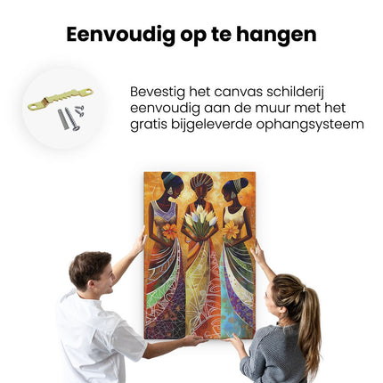 Canvas schilderij ophangen Drie Afrikaanse Vrouwen met Bloemen in hun Handen