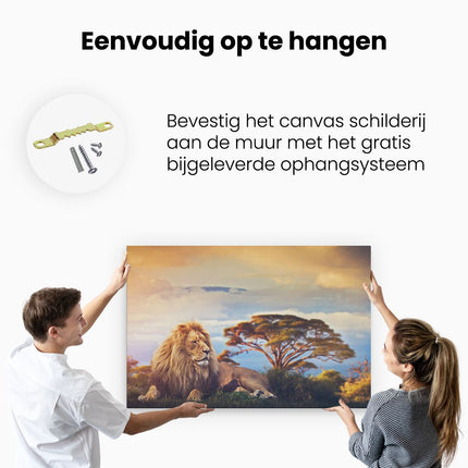 Canvas schilderij ophangen Leeuw Tijdens Zonsondergang