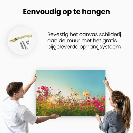 Canvas schilderij ophangen Kosmos Bloemenveld Met Een Opkomende Zon