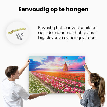 Canvas schilderij ophangen Kleurrijke Bloemenveld Met Een Windmolen