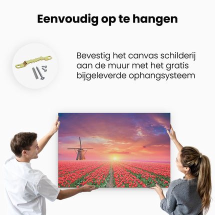 Canvas schilderij ophangen Rode Rozen Bloemenveld Met Een Windmolen