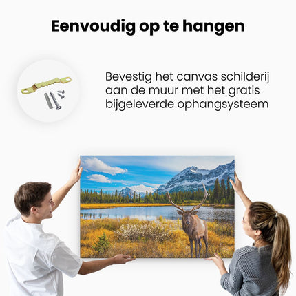 Canvas schilderij ophangen Hert In De Bergen Bij Een Meer