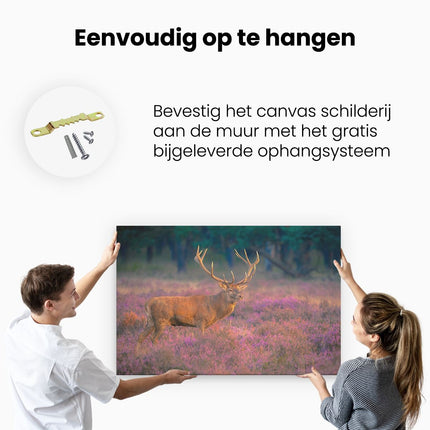 Canvas schilderij ophangen Hert In De Weide Tijdens Zonsondergang