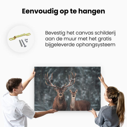 Canvas schilderij ophangen Twee Herten Met Sneeuw