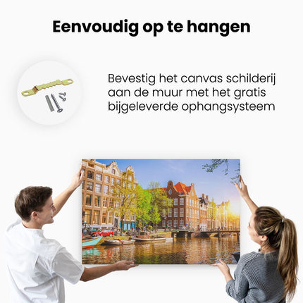 Canvas schilderij ophangen Amsterdamse Gracht Tijdens Zonsondergang