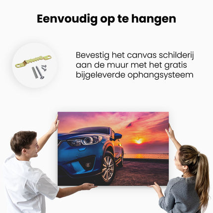 Canvas schilderij ophangen Blauwe Sportwagen Auto Bij Zonsondergang