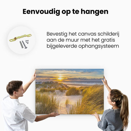 Canvas schilderij ophangen Strand En Duinen Tijdens Zonsondergang