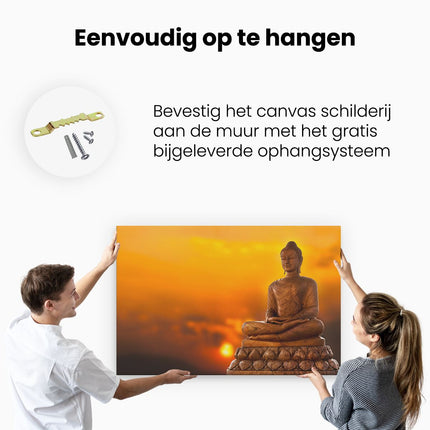 Canvas schilderij ophangen Boeddha Standbeeld Bij Zonsondergang