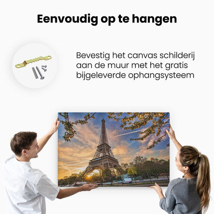 Canvas schilderij ophangen Eiffeltoren In Parijs Tijdens Zonsondergang