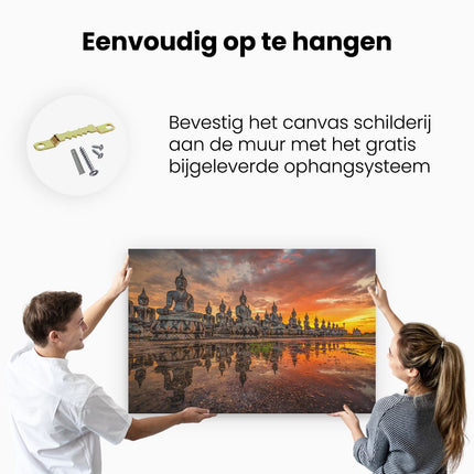 Canvas schilderij ophangen Boeddha Beelden Tijdens Zonsondergang