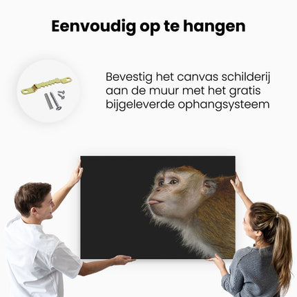 Canvas schilderij ophangen Apenkop Met Zijn Tong Uit - Aap