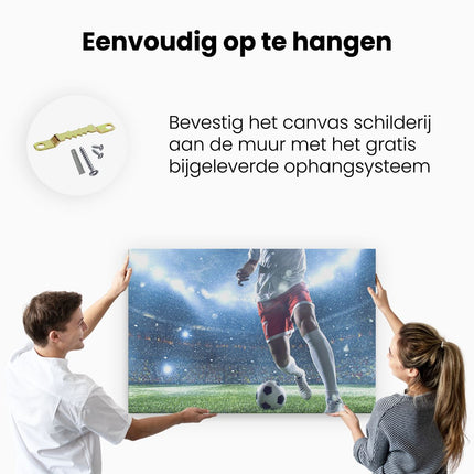 Canvas schilderij ophangen Voetbal Speler Met De Bal In Een Druk Stadion 