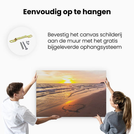 Canvas schilderij ophangen Zonsondergang Op Het Strand Met Een Hartje