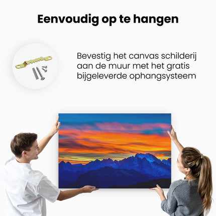 Canvas schilderij ophangen Oranje Zonsondergang In De Bergen