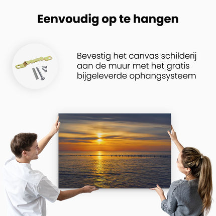 Canvas schilderij ophangen Zonsondergang In De Zee