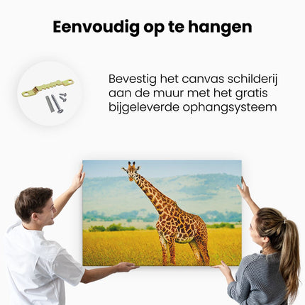 Canvas schilderij ophangen Giraffe In Het Veld