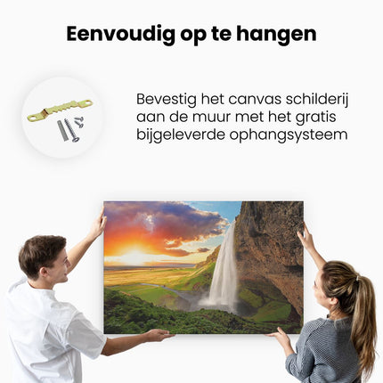 Canvas schilderij ophangen Waterval In IJsland Met Zonsondergang