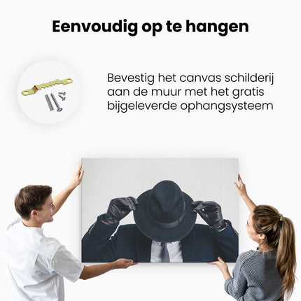 Canvas schilderij ophangen Zakenman Met Een Zwart Hoedje