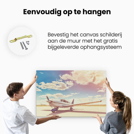 Canvas schilderij ophangen Gelande Vliegtuig Op De Luchthaven