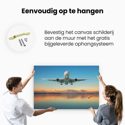 Canvas schilderij ophangen Vliegtuig Vliegt Boven Een Kleurrijke Zee