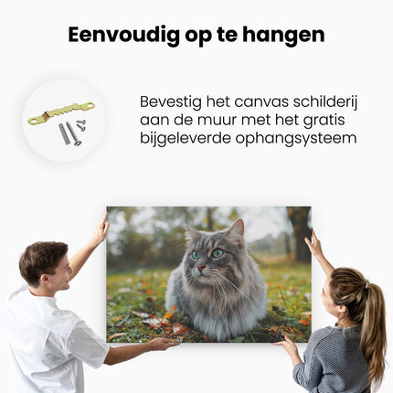 Canvas schilderij ophangen Kat Met Groene Ogen Op Het Gras