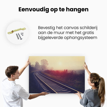 Canvas schilderij ophangen Spoorweg Rails Tijdens De Herfst Met Mist