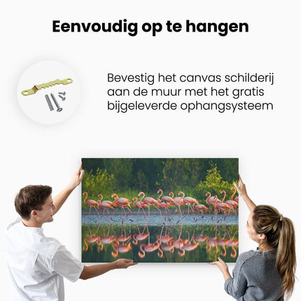 Canvas schilderij ophangen Kudde Flamingo's op het Water