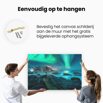 Canvas schilderij ophangen Noorderlicht boven het Water bij Rotsen