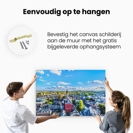 Canvas schilderij ophangen Maastricht Stad met Huizen