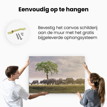 Canvas schilderij ophangen Kudde Buffels bij een Boom