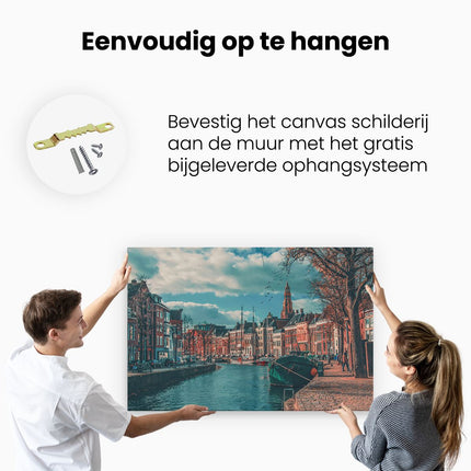 Canvas schilderij ophangen Gracht in Groningen 