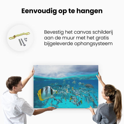 Canvas schilderij ophangen Zwerm Gele Vissen in het Water