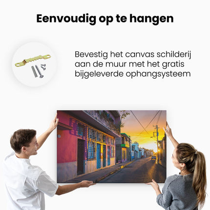 Canvas schilderij ophangen Cuba Kleurrijke Huisjes bij Zonsondergang