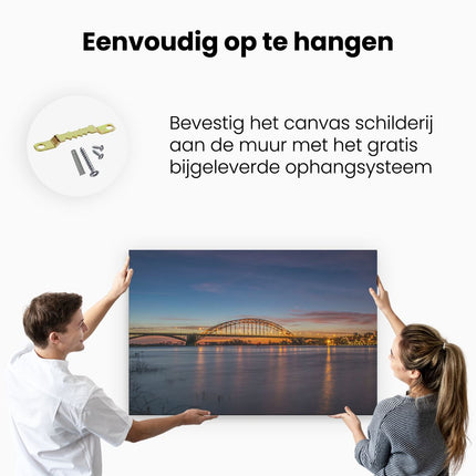 Canvas schilderij ophangen Waalbrug in Nijmegen 