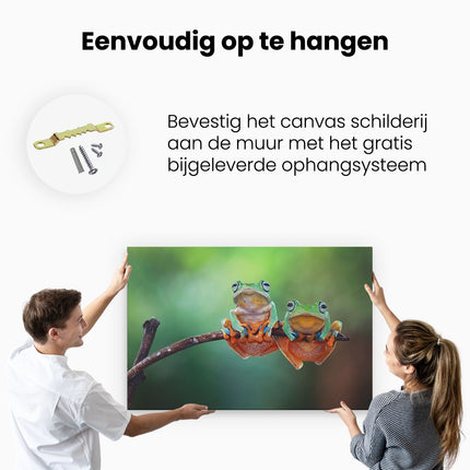 Canvas schilderij ophangen Twee Boomkikkers op een Tak