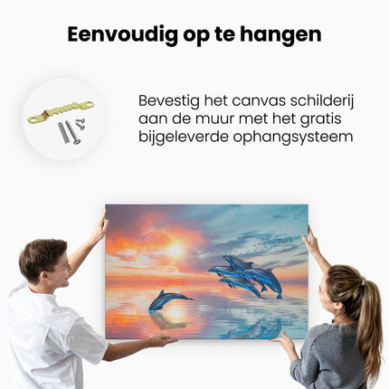 Canvas schilderij ophangen Groep Dolfijnen Springen uit het Water