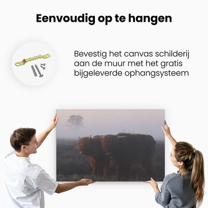 Canvas schilderij ophangen Twee Schotse Hooglanders in de Mist