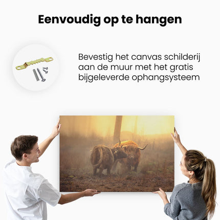 Canvas schilderij ophangen Twee Schotse Hooglanders in de Mist