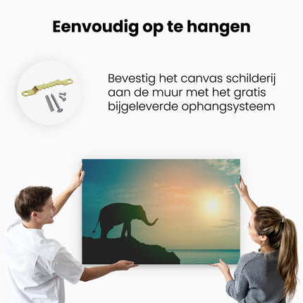 Canvas schilderij ophangen Olifant op een Rots aan de Zee bij Zonsondergang