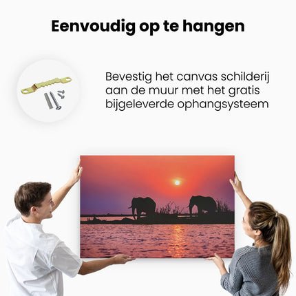 Canvas schilderij ophangen Twee Olifanten aan het Water bij Zonsondergang