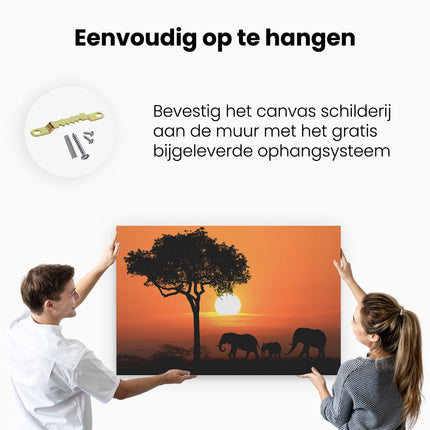 Canvas schilderij ophangen Olifanten Familie bij Zonsondergang - Olifant